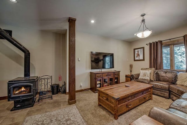 living room featuring a wood stove