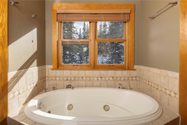 bathroom featuring tiled bath