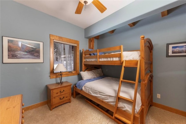 bedroom with ceiling fan and light colored carpet