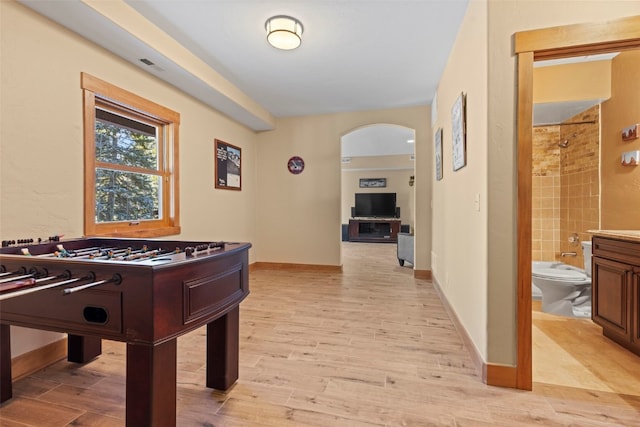 rec room featuring light hardwood / wood-style floors