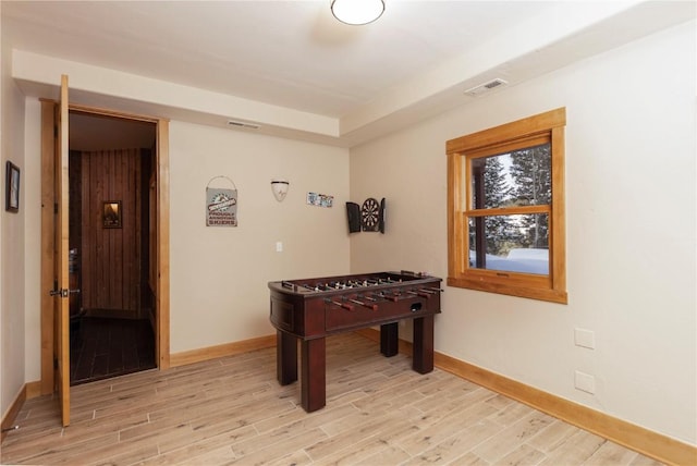 playroom with light wood-type flooring