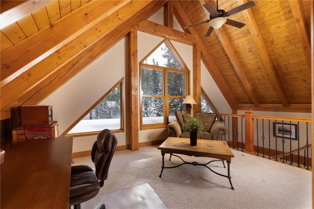 home office with carpet flooring, lofted ceiling with beams, ceiling fan, and wood ceiling