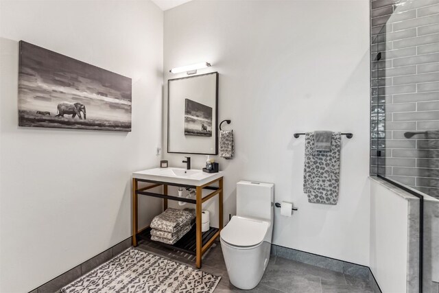 bathroom with sink and toilet