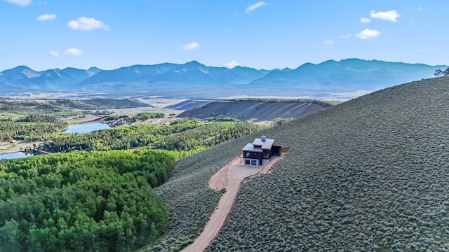 view of mountain feature featuring a water view