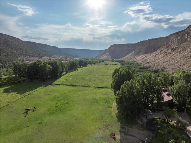 view of mountain feature featuring a rural view