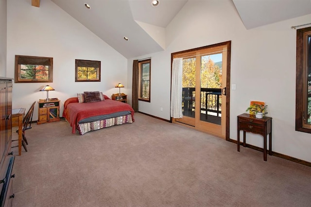 carpeted bedroom with access to outside and high vaulted ceiling