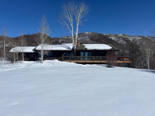 view of front of home with a mountain view