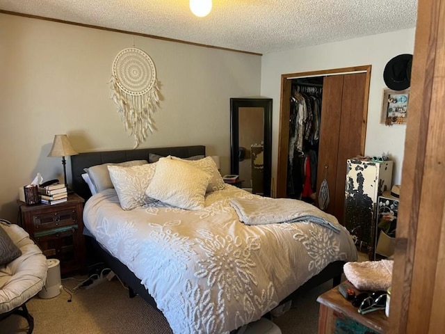 carpeted bedroom with crown molding, a closet, and a textured ceiling