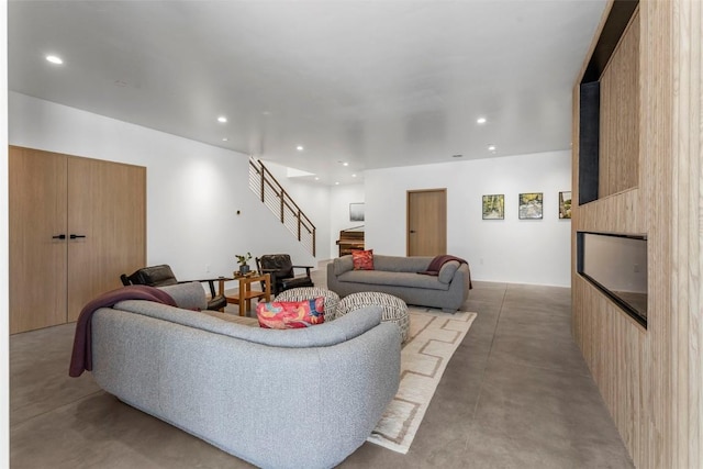 living room featuring concrete floors