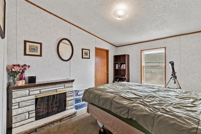 carpeted bedroom featuring a textured ceiling, a stone fireplace, lofted ceiling, and ornamental molding