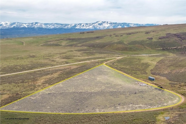 bird's eye view with a mountain view and a rural view