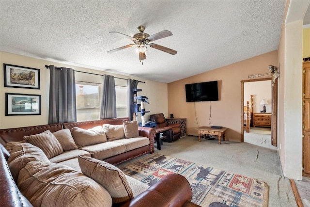 living room with light carpet, a textured ceiling, vaulted ceiling, and ceiling fan