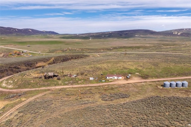 bird's eye view featuring a mountain view and a rural view