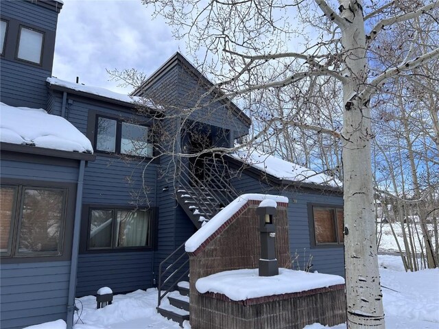 view of snow covered property