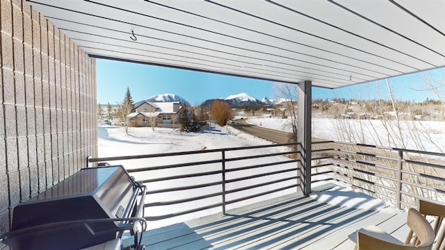 view of snow covered deck