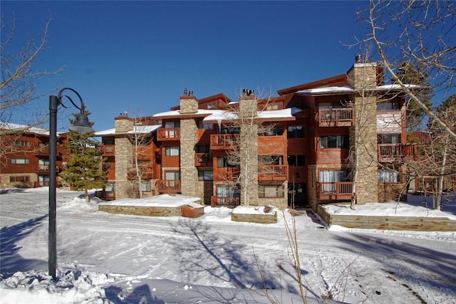 view of snow covered property