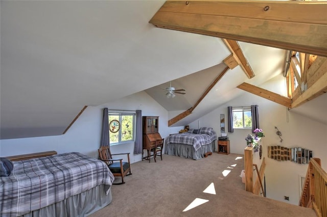 bedroom with light carpet, multiple windows, and lofted ceiling