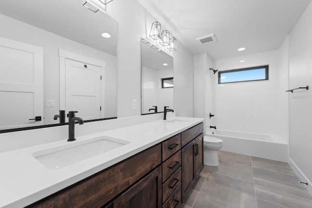 full bathroom with shower / bathing tub combination, vanity, and toilet