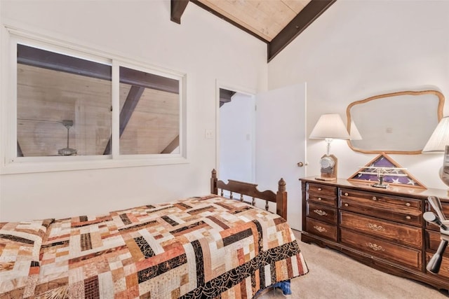 bedroom with beamed ceiling, carpet flooring, wooden ceiling, and high vaulted ceiling