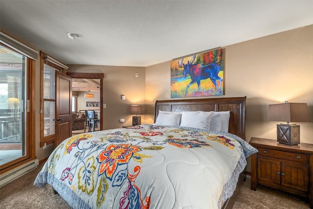 carpeted bedroom featuring a baseboard radiator