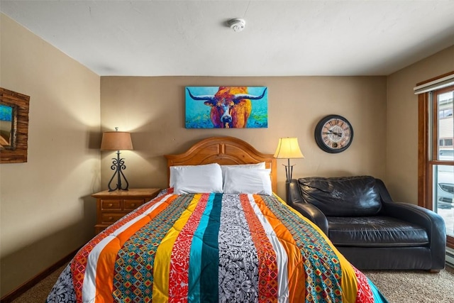 bedroom featuring carpet