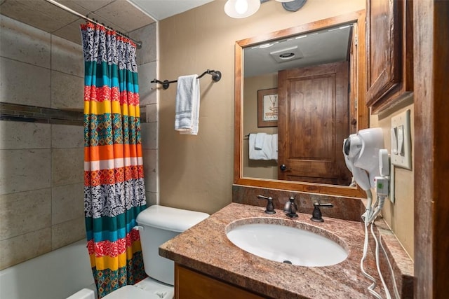 bathroom with toilet, vanity, and shower / bathtub combination with curtain