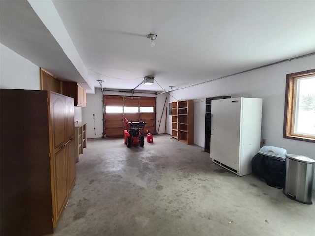 garage featuring white refrigerator