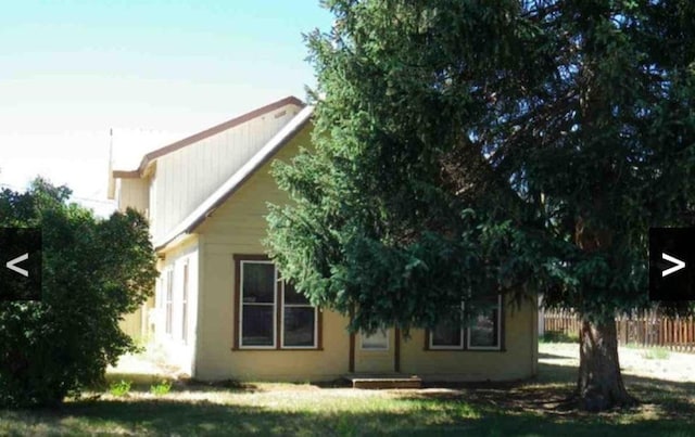 view of home's exterior featuring a lawn