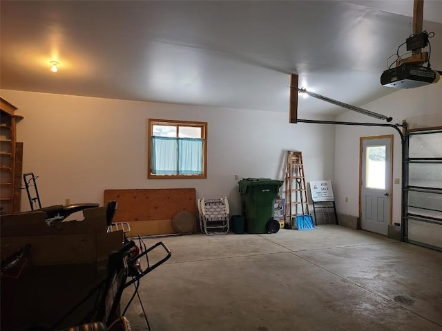 garage featuring a garage door opener