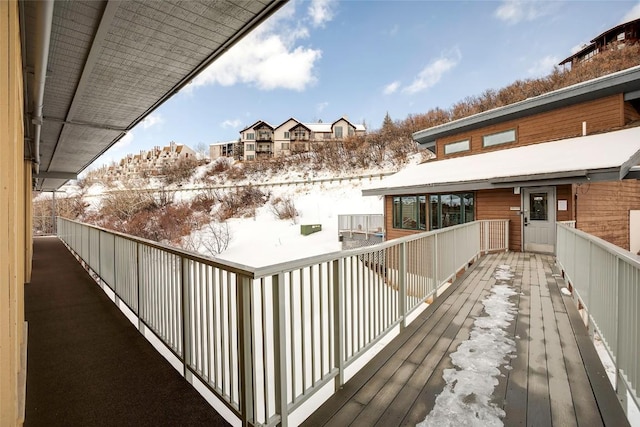 wooden balcony featuring a deck