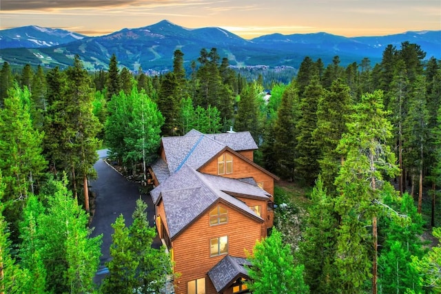 aerial view at dusk with a mountain view