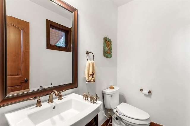 bathroom featuring a sink and toilet