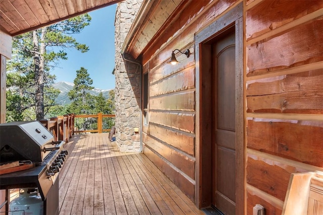 wooden terrace with grilling area