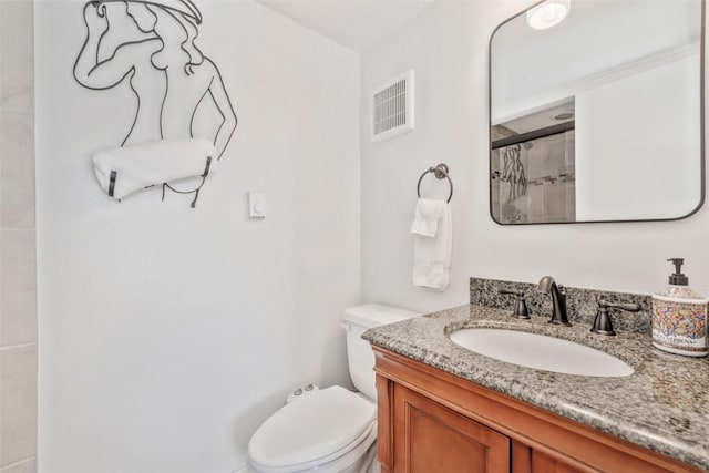 bathroom with a shower with shower curtain, vanity, and toilet