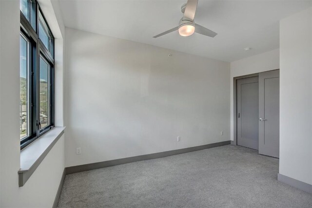 spare room with ceiling fan