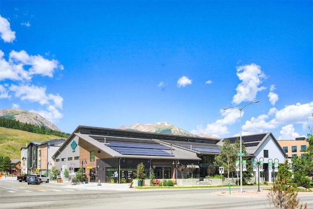 view of building exterior with a mountain view