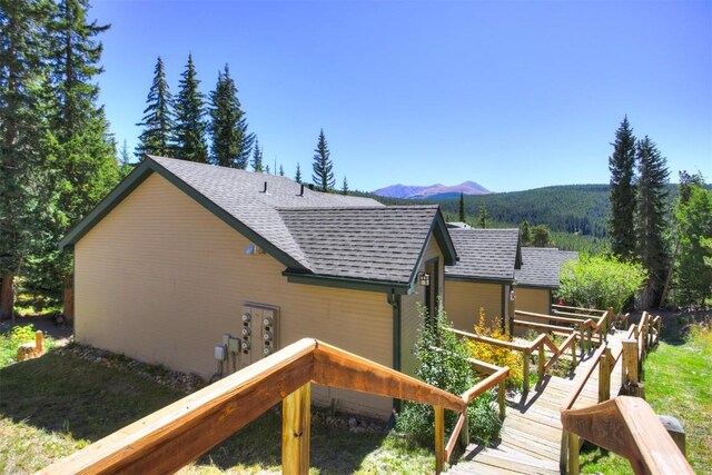 view of home's exterior with a mountain view