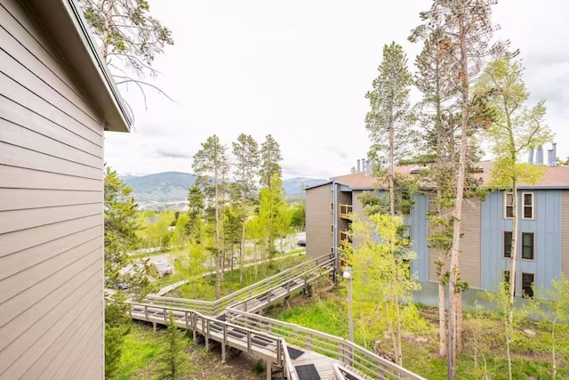 balcony featuring a mountain view