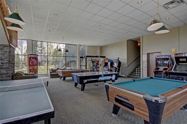 playroom featuring floor to ceiling windows, carpet, a drop ceiling, and billiards