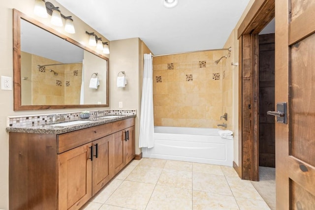 bathroom featuring vanity, tile patterned flooring, and shower / tub combo with curtain