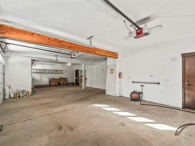 garage featuring a garage door opener