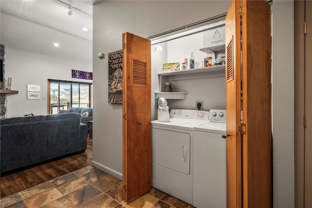 laundry room with washer and dryer, baseboards, recessed lighting, and laundry area