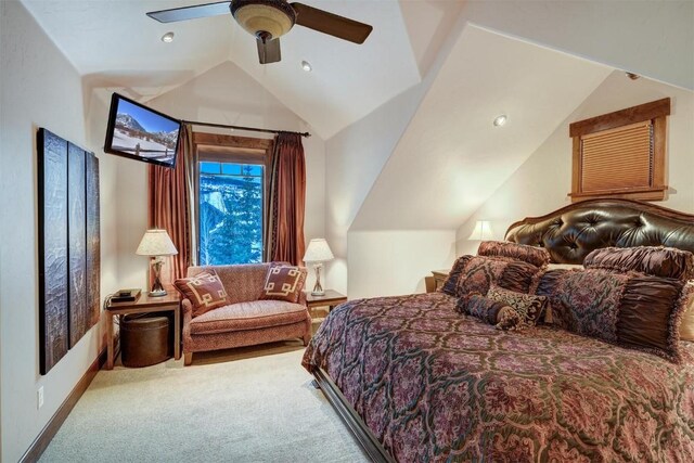 bedroom featuring ceiling fan, carpet, and vaulted ceiling