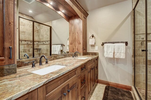 bathroom featuring vanity and walk in shower