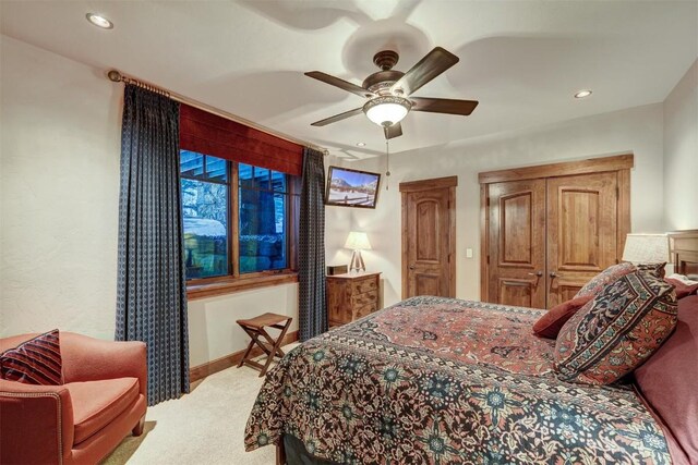 bedroom featuring carpet and ceiling fan