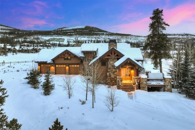 log cabin featuring a mountain view