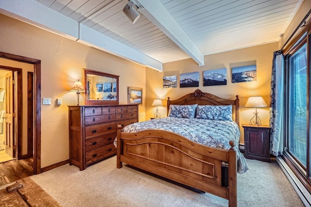 bedroom with a baseboard radiator, light carpet, wooden ceiling, and beam ceiling