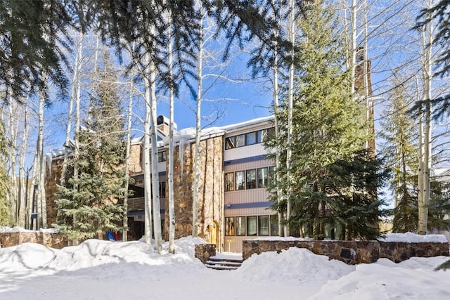 view of snow covered property