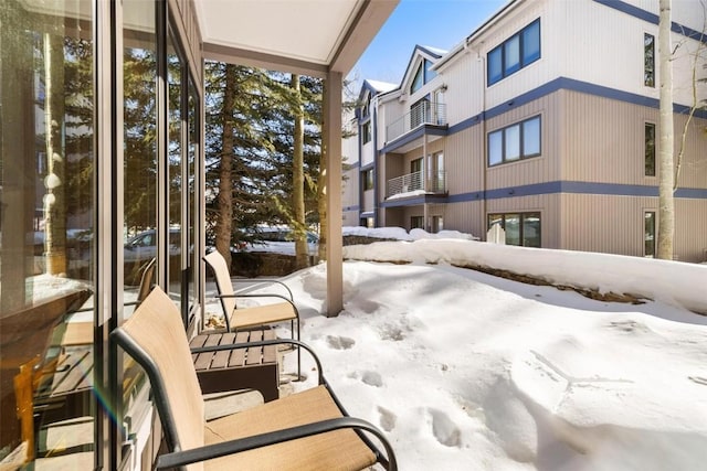 view of snow covered patio