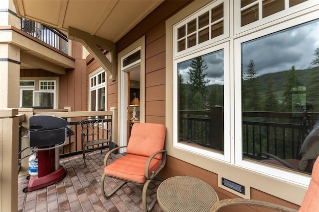 view of patio with a balcony